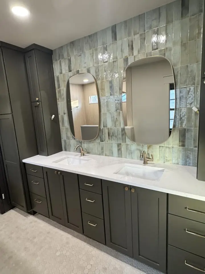 Double vanity bathroom renovation with custom finishes